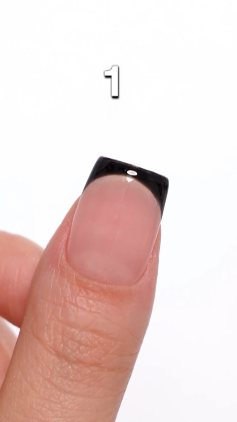 A split display showing a nail pressing into a clear silicone stamper to instantly form a crisp, white French tip smile line.
